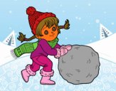 Niña con gran bola de nieve