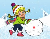 Niña con gran bola de nieve