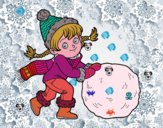 Niña con gran bola de nieve