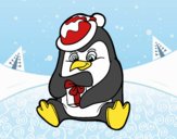 Un pingüino con regalo de Navidad