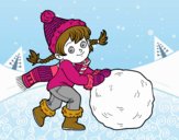 Niña con gran bola de nieve