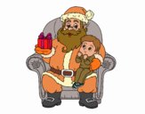 Papá Noel y niño en Navidad