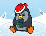 Un pingüino con regalo de Navidad