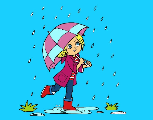 Niña con paraguas bajo la lluvia