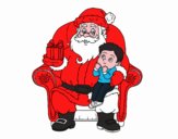 Papá Noel y niño en Navidad