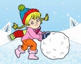 Niña con gran bola de nieve