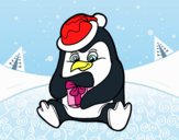 Un pingüino con regalo de Navidad