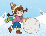 Niña con gran bola de nieve