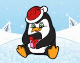 Un pingüino con regalo de Navidad