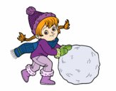 Niña con gran bola de nieve