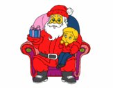 Papá Noel y niño en Navidad