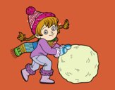 Niña con gran bola de nieve