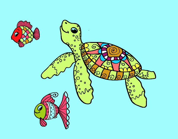 Tortuga de mar con peces