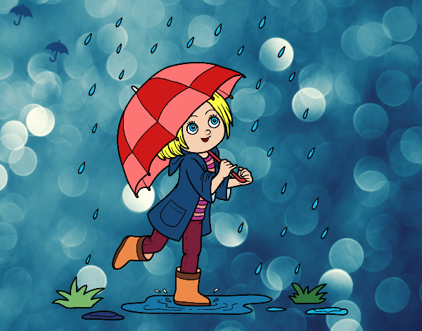 Niña con paraguas bajo la lluvia