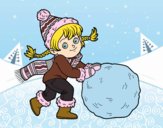 Niña con gran bola de nieve