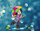 Niña con paraguas bajo la lluvia