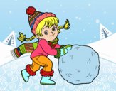 Niña con gran bola de nieve