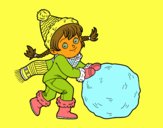 Niña con gran bola de nieve