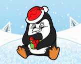 Un pingüino con regalo de Navidad