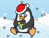 Un pingüino con regalo de Navidad