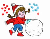 Niña con gran bola de nieve