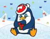 Un pingüino con regalo de Navidad