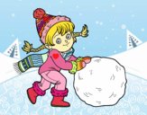 Niña con gran bola de nieve