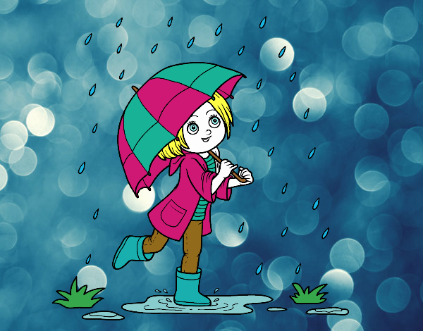 Niña con paraguas bajo la lluvia