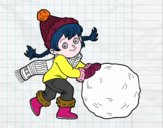 Niña con gran bola de nieve