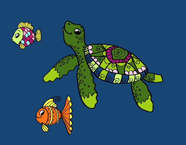 Tortuga de mar con peces