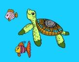 Tortuga de mar con peces