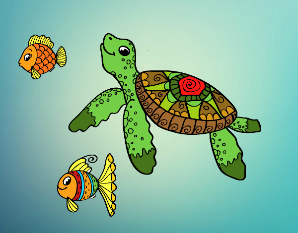 Tortuga de mar con peces