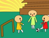 Niños jugando a futbol