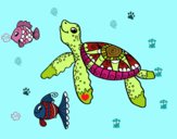 Tortuga de mar con peces