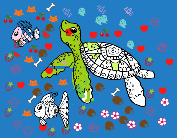 Tortuga de mar con peces