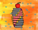 Libros y manzana