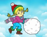 Niña con gran bola de nieve