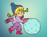 Niña con gran bola de nieve