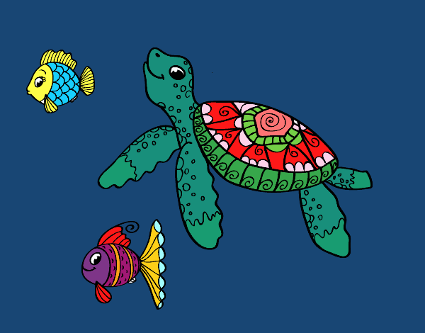 Tortuga de mar con peces