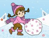 Niña con gran bola de nieve