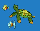 Tortuga de mar con peces