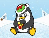 Un pingüino con regalo de Navidad