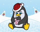 Un pingüino con regalo de Navidad