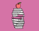 Libros y manzana