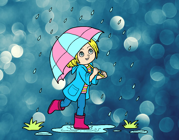 niña  feliz  jugando   bajo  la  lluvia