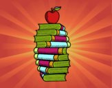 Libros y manzana