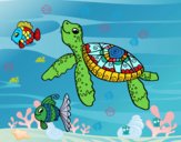 Tortuga de mar con peces