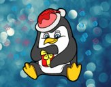 Un pingüino con regalo de Navidad