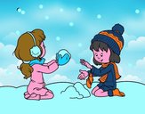 Niñas jugando con la nieve