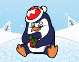 Un pingüino con regalo de Navidad